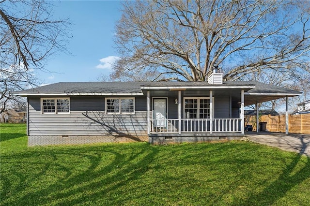 view of front of property with driveway, an attached carport, crawl space, covered porch, and a front yard