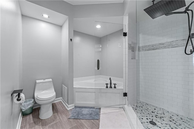 3636 Habersham Rd NW Unit 2101, Atlanta, GA 30305 - bathroom featuring a garden tub, a shower stall, recessed lighting, and wood finished floors