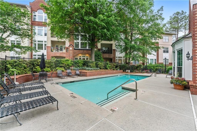 3636 Habersham Rd NW Unit 2101, Atlanta, GA 30305 - community pool featuring a patio area