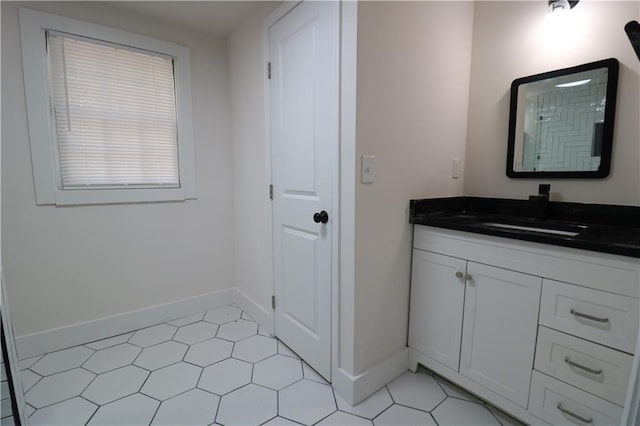 bathroom featuring tile patterned floors and vanity