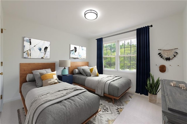 bedroom with light colored carpet
