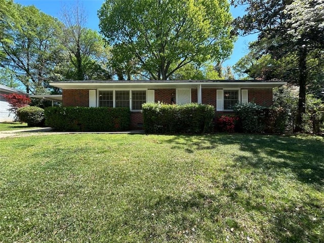 779 Casplan St SW, Atlanta, GA 30310 - ranch-style home with brick siding and a front yard