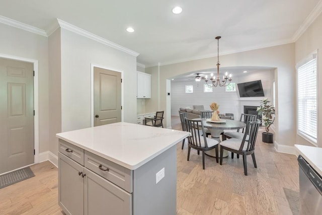 4230 Old Cherokee St, Acworth, GA 30101 - kitchen featuring dishwasher, a chandelier, light countertops, light wood-type flooring, and crown molding