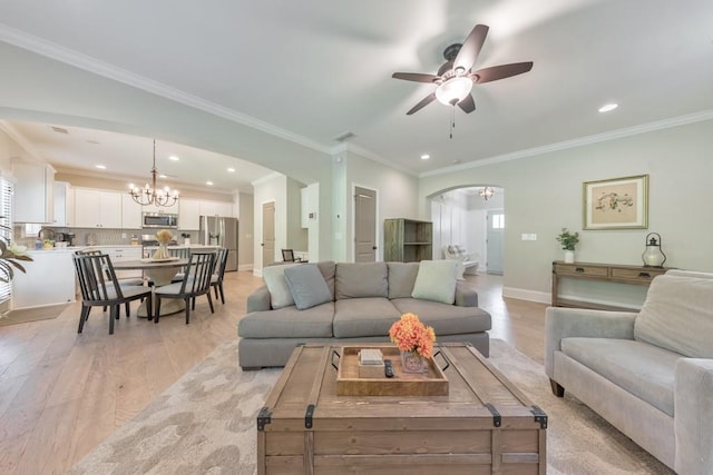 4230 Old Cherokee St, Acworth, GA 30101 - living room featuring arched walkways, a chandelier, light wood-style floors, a ceiling fan, and recessed lighting
