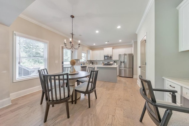 4230 Old Cherokee St, Acworth, GA 30101 - dining space with ornamental molding, a chandelier, light wood-type flooring, and recessed lighting