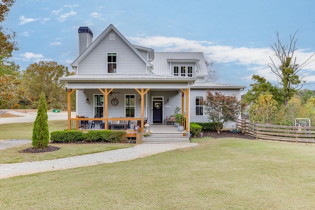 view of front of home featuring a porch and a front lawn