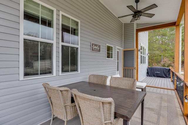 exterior space with ceiling fan