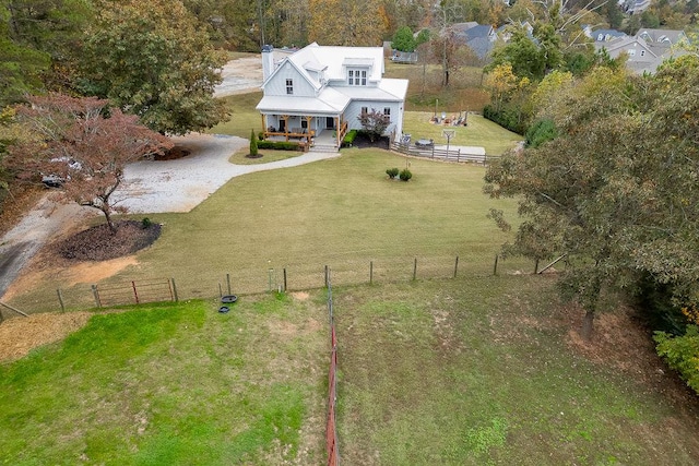 birds eye view of property featuring a rural view