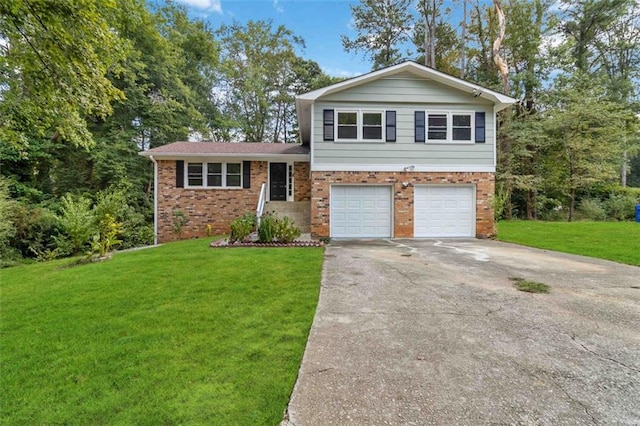 tri-level home featuring a garage and a front yard