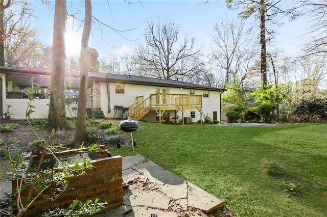 view of yard featuring a deck