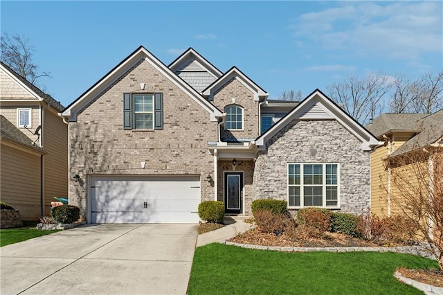 craftsman inspired home featuring a garage, a front yard, concrete driveway, and brick siding