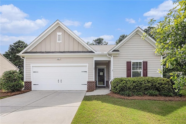 23 Stable Gate Dr, Cartersville, GA 30120 - view of front of home with board and batten siding, brick siding, driveway, a front lawn, and a garage