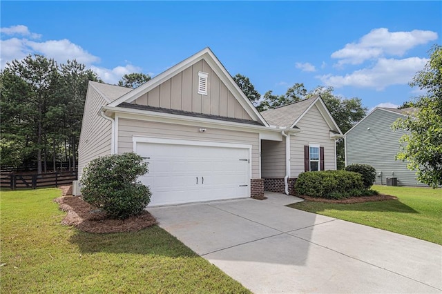 23 Stable Gate Dr, Cartersville, GA 30120 - view of front facade featuring board and batten siding, concrete driveway, and an attached garage