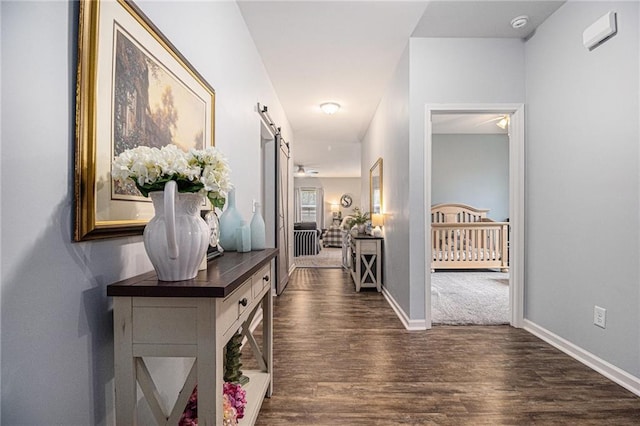 23 Stable Gate Dr, Cartersville, GA 30120 - corridor featuring wood finished floors and a barn door