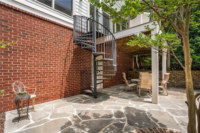 1601 Marlbrook Dr NE, Atlanta, GA 30307 - view of patio / terrace featuring stairs and outdoor dining space
