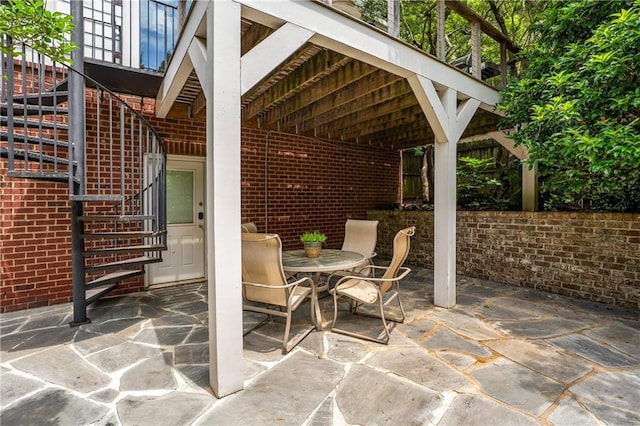 1601 Marlbrook Dr NE, Atlanta, GA 30307 - view of patio featuring stairs and outdoor dining space