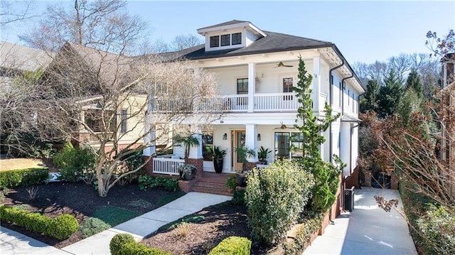 1601 Marlbrook Dr NE, Atlanta, GA 30307 - greek revival house with covered porch, a balcony, and a ceiling fan