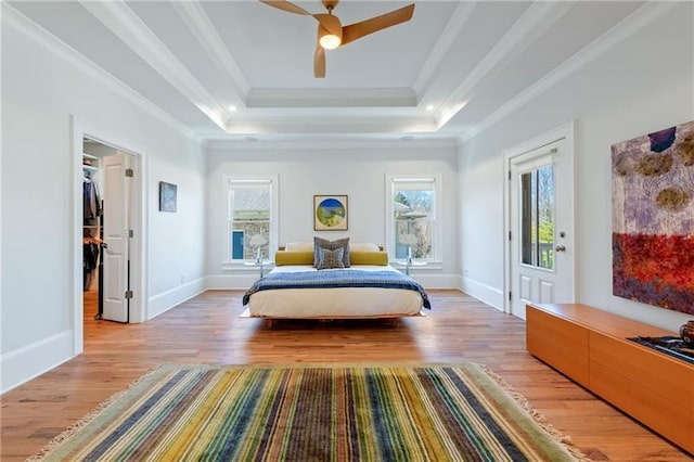 1601 Marlbrook Dr NE, Atlanta, GA 30307 - sitting room featuring a raised ceiling, crown molding, light wood-style flooring, a ceiling fan, and baseboards