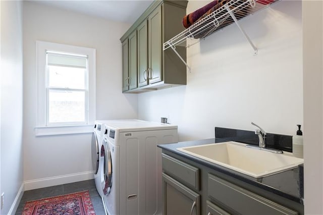 1601 Marlbrook Dr NE, Atlanta, GA 30307 - laundry room with washer and dryer, cabinet space, baseboards, and dark tile patterned floors