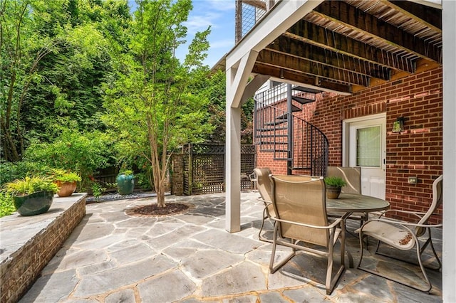 1601 Marlbrook Dr NE, Atlanta, GA 30307 - view of patio featuring outdoor dining area and stairs