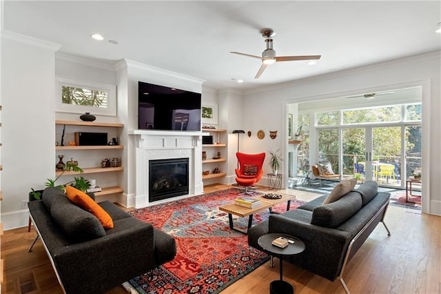 1601 Marlbrook Dr NE, Atlanta, GA 30307 - living room with a ceiling fan, wood finished floors, recessed lighting, ornamental molding, and a glass covered fireplace