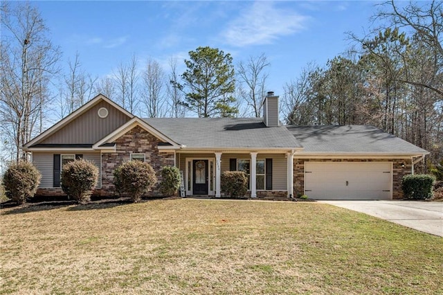 single story home with a front yard, an attached garage, a chimney, concrete driveway, and stone siding