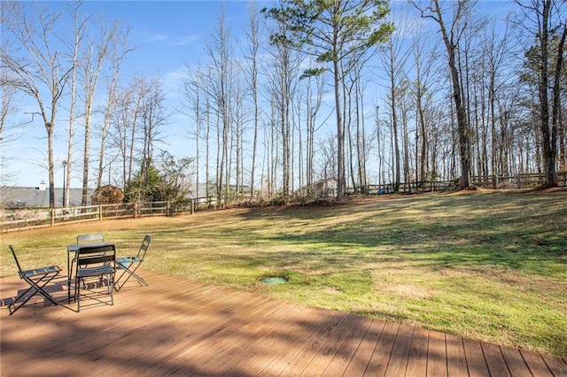 exterior space featuring a yard and fence