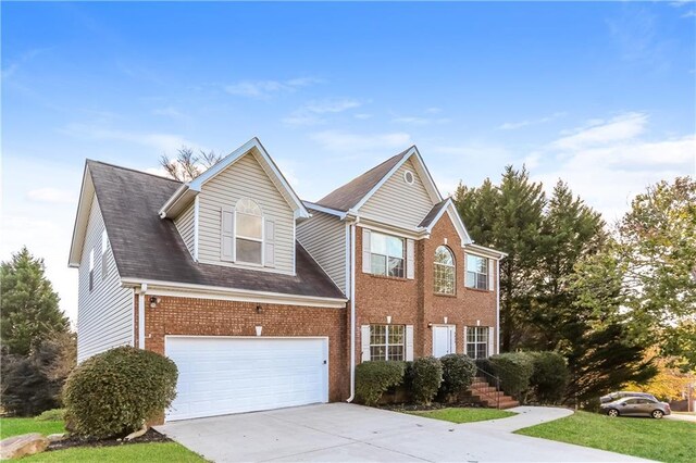 view of front of property with a garage