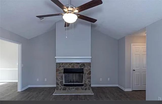 6030 Creekside Dr, Columbus, GA 31907 - unfurnished living room with a ceiling fan, wood finished floors, vaulted ceiling, and a fireplace