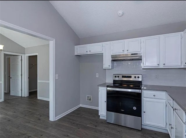 6030 Creekside Dr, Columbus, GA 31907 - kitchen featuring decorative backsplash, vaulted ceiling, white cabinets, electric stove, and under cabinet range hood