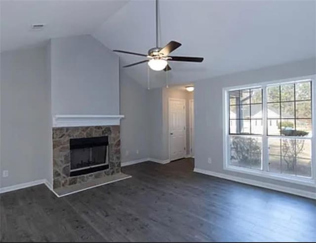 6030 Creekside Dr, Columbus, GA 31907 - unfurnished living room featuring dark wood-style flooring, ceiling fan, a fireplace, baseboards, and lofted ceiling
