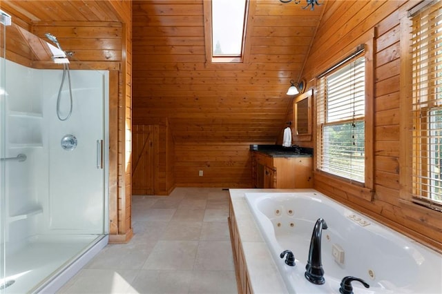442 Cartecay River Run, Ellijay, GA 30536 - bathroom featuring wood walls, a shower stall, a jetted tub, vanity, and tile patterned flooring