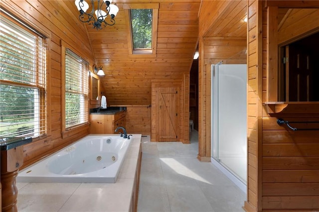 442 Cartecay River Run, Ellijay, GA 30536 - bathroom featuring wood walls, a jetted tub, a chandelier, lofted ceiling, and a shower stall