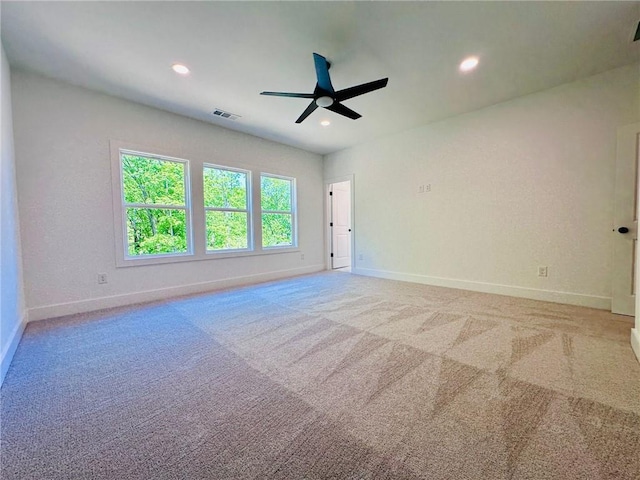 unfurnished room featuring visible vents, baseboards, ceiling fan, carpet floors, and recessed lighting