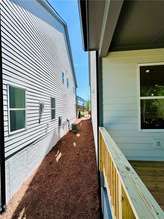 view of home's exterior with central air condition unit