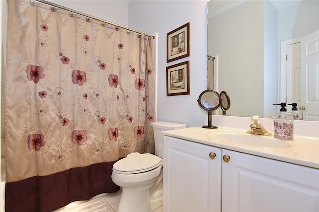 bathroom featuring tile patterned floors, vanity, toilet, and a shower with shower curtain