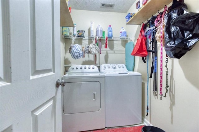 1015 Carriage Way, Loganville, GA 30052 - laundry area featuring washer and clothes dryer