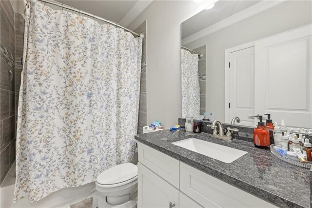 full bathroom with vanity, toilet, and shower / bath combination with curtain