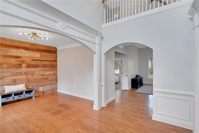 interior space with crown molding and hardwood / wood-style floors