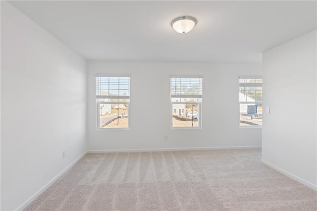 1119 Lockhart Way, Douglasville, GA 30135 - carpeted spare room with baseboards