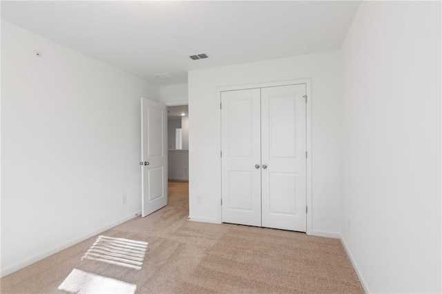 1119 Lockhart Way, Douglasville, GA 30135 - unfurnished bedroom with light colored carpet and a closet