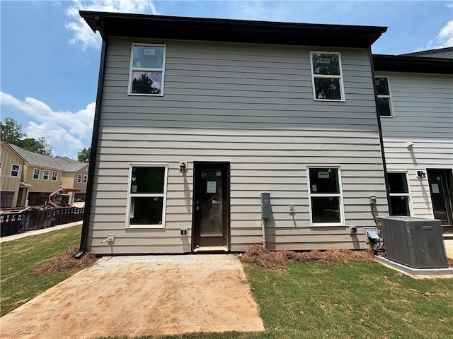 1119 Lockhart Way, Douglasville, GA 30135 - rear view of house with a patio