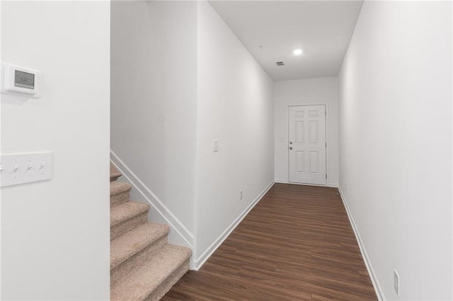 1119 Lockhart Way, Douglasville, GA 30135 - hallway featuring dark wood-style floors, stairway, and recessed lighting