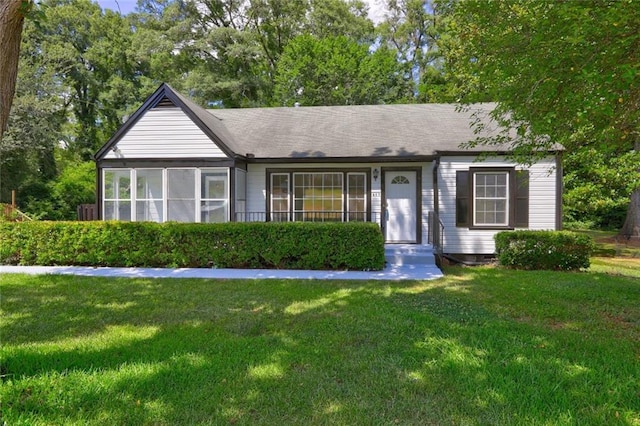 view of front of home with a front yard