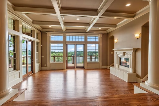 2742 High Vista Pt, Gainesville, GA 30501 - unfurnished living room with wood finished floors, a premium fireplace, recessed lighting, coffered ceiling, and beam ceiling
