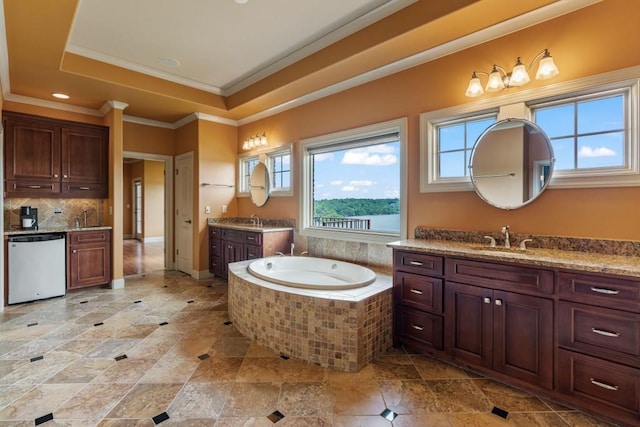 2742 High Vista Pt, Gainesville, GA 30501 - bathroom featuring crown molding, two vanities, decorative backsplash, a bath, and a raised ceiling