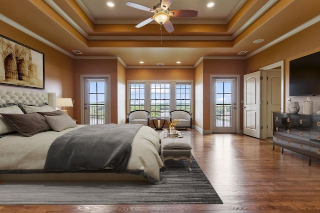2742 High Vista Pt, Gainesville, GA 30501 - bedroom with access to exterior, wood finished floors, a tray ceiling, ornamental molding, and recessed lighting
