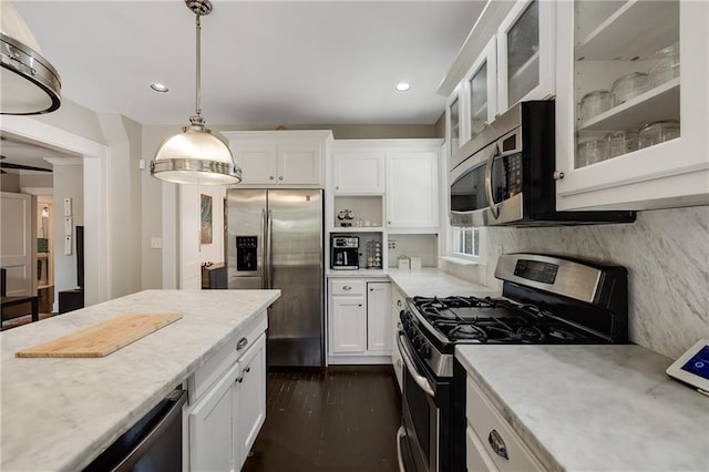 311 Glendale Ave, Decatur, GA 30030 - kitchen with stainless steel appliances, white cabinets, pendant lighting, dark wood-type flooring, and recessed lighting