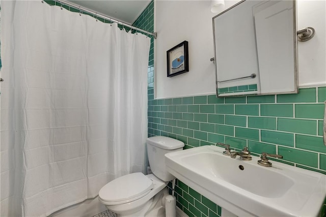 311 Glendale Ave, Decatur, GA 30030 - bathroom featuring tile walls and a shower with shower curtain