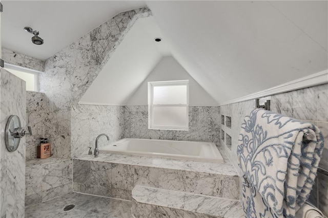 311 Glendale Ave, Decatur, GA 30030 - full bath with plenty of natural light, a garden tub, vaulted ceiling, and tile walls